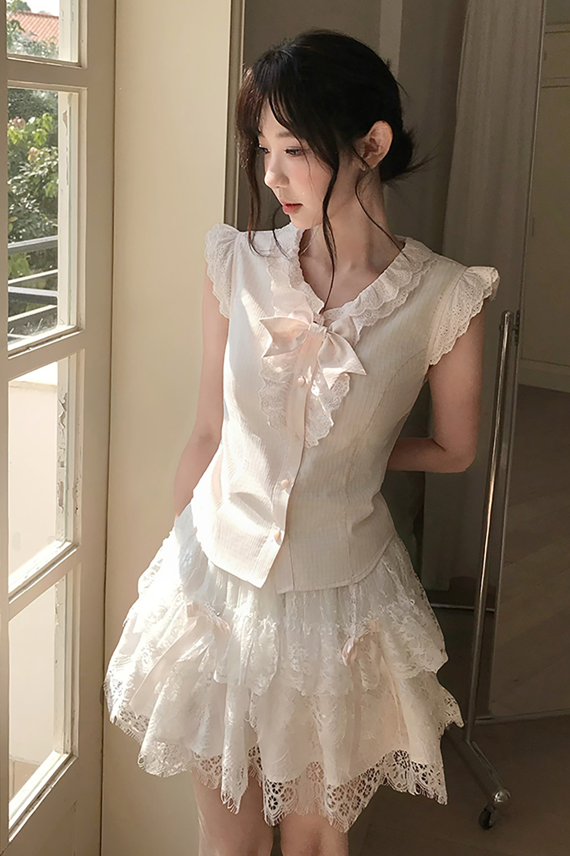 フライングスリーブガーリートップス